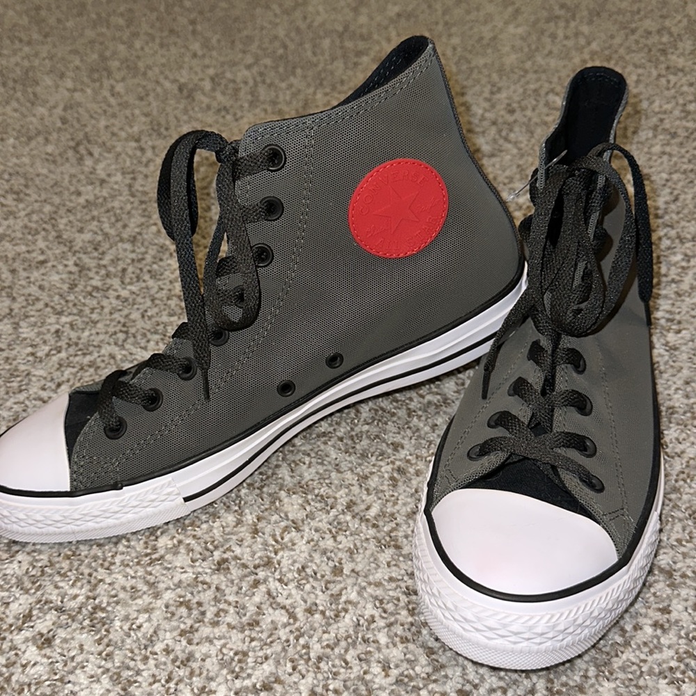 NEW Converse Chuck Taylor Hi Top - Mens 9/ Women’s 11. Gray with red patch
